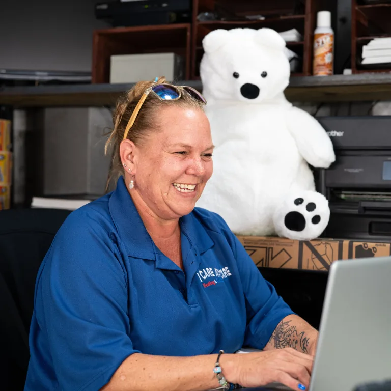 I Care Air Care family team and service vans in Wesley Chapel, FL