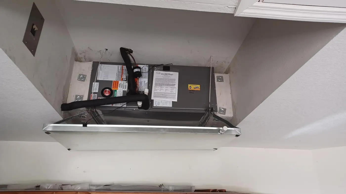 Air handler installed in a closet on Alan Jones's heat pump job