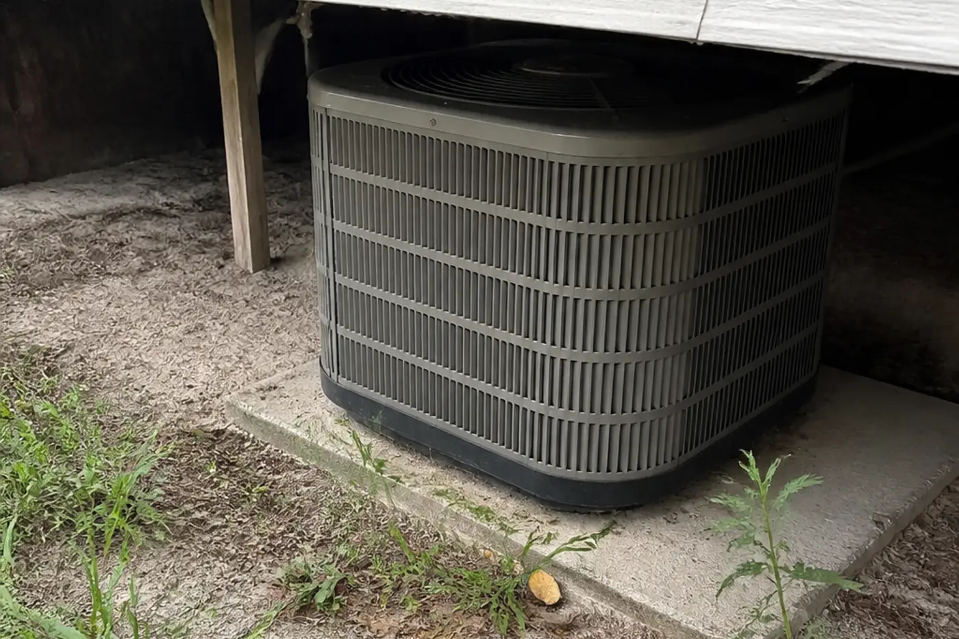 Manufactured-home platform AC unit in Zephyrhills, typical of Betmar Acres HVAC